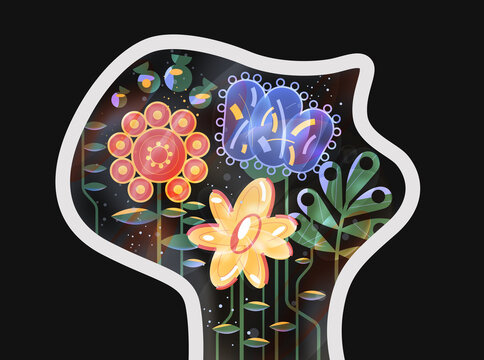 Human head silhouette with blooming flowers inside