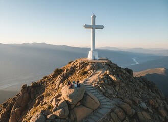 Holly White Cross on Rocky Mountain Summit at Sunset with Believers Resting Near Stone Steps suitable for good friday celebration and christianity journey