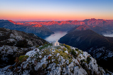 Small Stone Church on Mountain Peak Overlooking Kotor Bay at Sunset