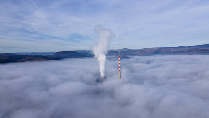 Chimney Tower Piercing Dense Clouds
