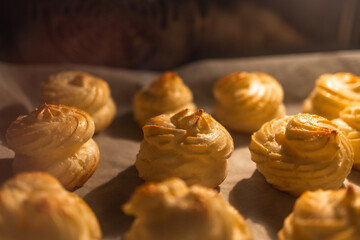 Cream Puffs Baking in Oven