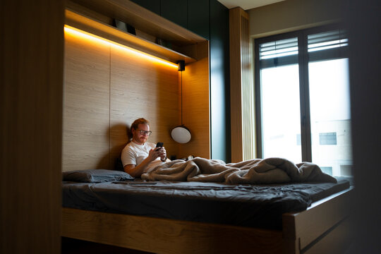 Using phone in a bedroom