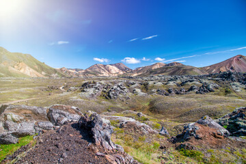 Sunny day in Landmannalaugar Iceland showcasing vibrant landscape, mountains, and wilderness