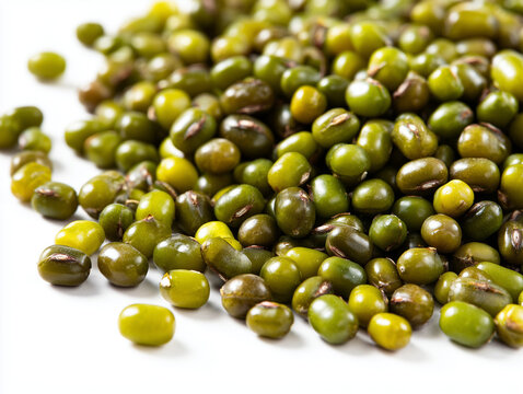 A close-up, high-angle view of a pile of raw, dried mung beans (Vigna radiata), also known as green gram, scattered on a plain white background. 