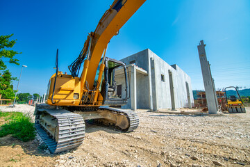 Equipment on excavation on construction site. Excavator on earthmoving. Backhoe dig sand, ground in quarry