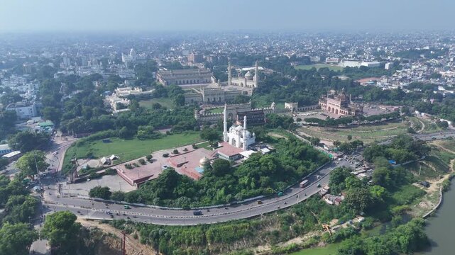 Drone shot of Bara Imambara and Rumi Gate in Lucknow with Gomti River and city skyline