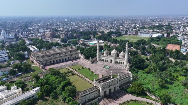 Drone shot of Bara Imambara and Rumi Gate in Lucknow with Gomti River and city skyline