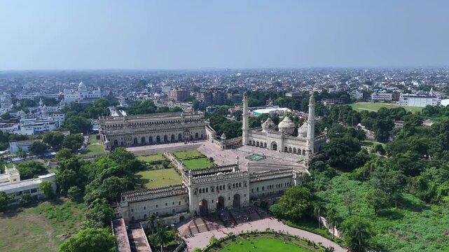 Drone shot of Bara Imambara and Rumi Gate in Lucknow with Gomti River and city skyline