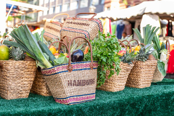 Fresh fruit and vegetable baskets at Hamburg Altona Fish Market outdoors