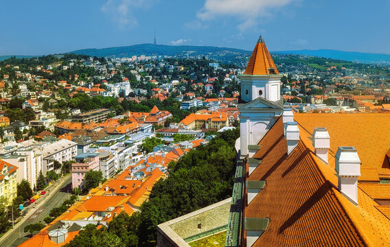 Elevated view from Bratislava Castle overlooking the historic old town, modern skyline