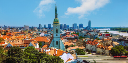 Elevated view from Bratislava Castle overlooking the historic old town, modern skyline