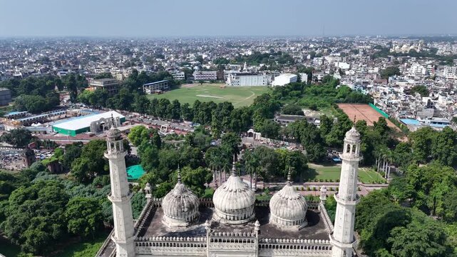 Drone shot of Bara Imambara and Rumi Gate in Lucknow with Gomti River and city skyline