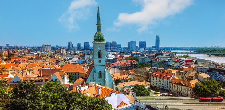 Elevated view from Bratislava Castle overlooking the historic old town, modern skyline