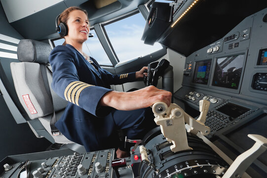 Flight captain operating airplane cockpit at Bavaria Studio Munich