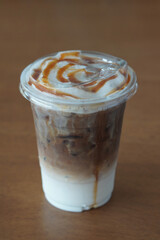 coffee in a plastic cup, placed on a wooden table background, drink, food, object, decor, copy space