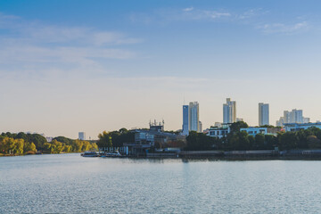 Fototapeta premium The skyline of modern urban architecture and the scenery of Jinji Lake in Suzhou, Jiangsu Province, China, on December 8, 2025 