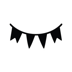 Silhouette of festive triangular flags strung up on a party string