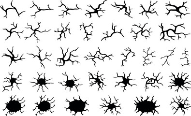 A diverse collection of various black crack and fracture patterns displayed on a pristine white background