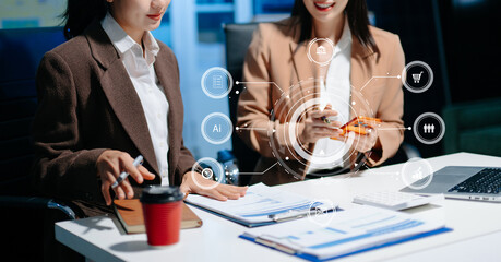 Asian Team business meeting presentation. Hand businesswoman working project in modern office.Laptop computer and tablet and smart phone