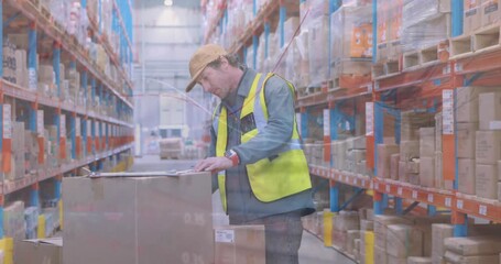 Animation of graphs over caucasian male warehouse worker in warehouse - Powered by Adobe