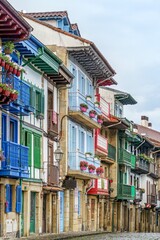 Obraz premium Colorful Traditional Houses with Bright Wooden Balconies, Hondarribia, Fuenterrabia, Basque Country, Spain