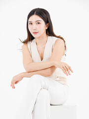 Portrait of attractive asian professional cheerful beautiful young woman in business work shirt style long black hair smile sitting posing happy confident positive on isolate white background studio.