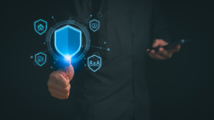 Person touching digital shield icon for cybersecurity, data protection, life insurance, and financial safety. Futuristic risk management and global security concept.