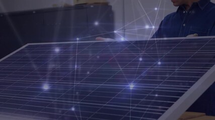 Animation of network of connections over caucasian engineer by solar panel - Powered by Adobe