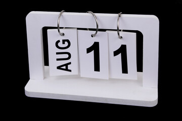 August 11 on calendar on black background