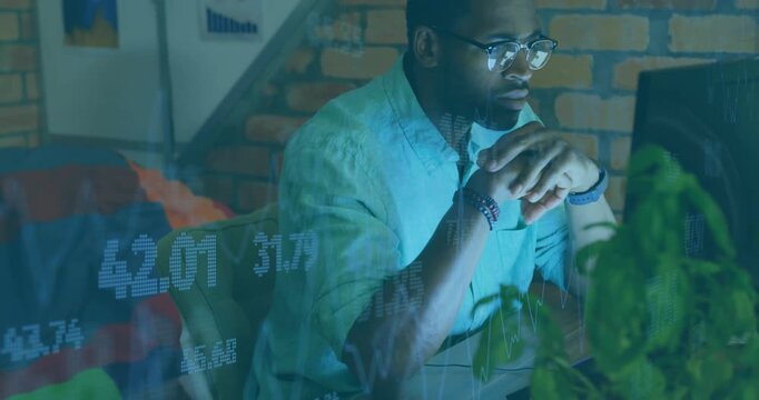 Animation of graphs and trading board over african american man analyzing reports on computer