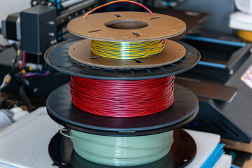 Spool of yellow pla filament for printing 3d printer