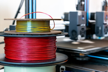 Spool of yellow pla filament for printing 3d printer