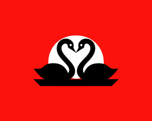 swan couple on red