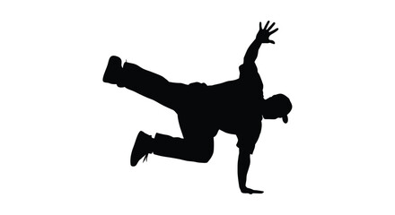 Dynamic breakdancer in mid air pose captured as a striking silhouette © Rita