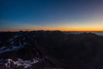 Dawn from Rocciamelone mountain peak in Graian Alps in Italy