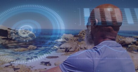 Digital data processing animation over person looking at ocean landscape - Powered by Adobe