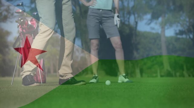Golfing partners demonstrating sports tech on green, showing golf ball and animated flag overlay