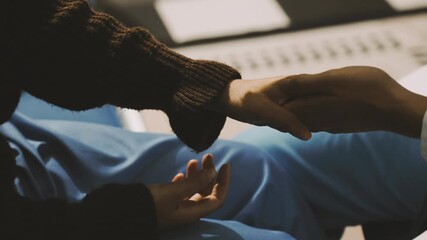 female doctor hold hand of woman patient give comfort, express health care sympathy, medical help trust support encourage reassure infertile patient at medical visit, closeup view