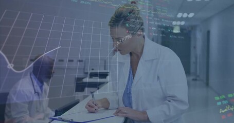 Female doctor writing patient notes at chart station while digital graphs rising for data review - Powered by Adobe