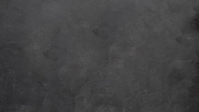 Seamless abstract dark gray concrete wall texture surface background for creative designs