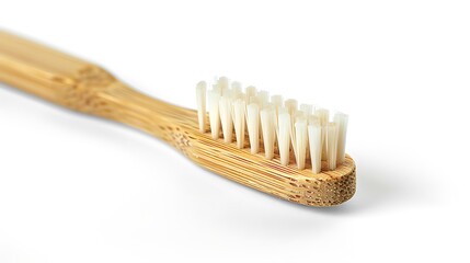 Bamboo toothbrush featuring soft white bristles promotes sustainable oral hygiene practices.