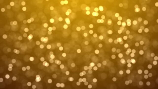 Abstract Golden Bokeh Background with Falling Glowing Particles and Shimmering Light.Elegant gold animation featuring soft glowing bokeh particles falling gently for festive, luxury, and holiday video