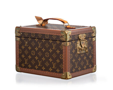 Louis Vuitton briefcase, Boite a Flacons model in monogram canvas with natural cowhide and brass details, photographed on a white background. Milan, Italy, October 3_2025