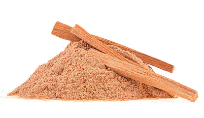 Sticks and powder of sandalwood isolated on a white background. Perfume, medicine. Tree of the genus Santalum.