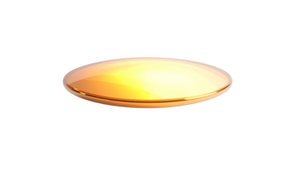 Gleaming, golden, circular object, lit with highlights on black background
