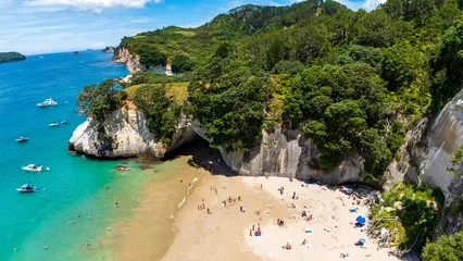 Fototapeten Dom Bucht Aerial View of Cathedral Cove Beach, New Zealand – Turquoise Waters and Coastal Cliffs  © aure50
