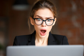 Woman shows shock while reading online news during evening hours Generative AI