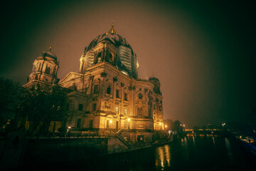 Iconic Berlin Cathedral Covered in Snow at Winter Time night
