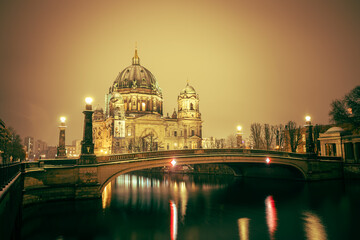 Iconic Berlin Cathedral Covered in Snow at Winter Time night