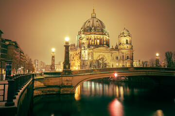 Iconic Berlin Cathedral Covered in Snow at Winter Time night